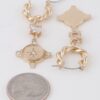 Twisted Star Drop Earrings with Shimmer Detail