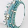 Nature-Inspired Beaded Bracelet with Decorative Accents