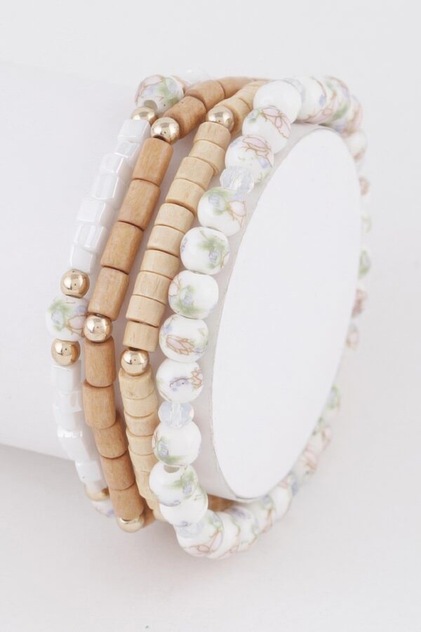 Nature-Inspired Beaded Bracelet with Decorative Accents
