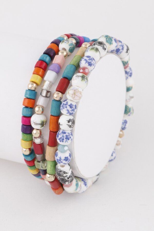Nature-Inspired Beaded Bracelet with Decorative Accents