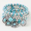 Antique-Inspired Beaded Bracelet with Summer Hat Charm