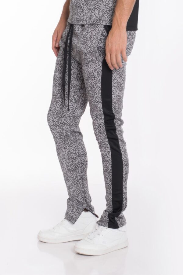 Elephant Print Track Pants with Ankle Zippers