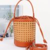 Braided Bamboo Tube Bag with Structured Top Handle