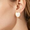 Heart-Shaped Pearl Stud Earrings with Polished Metal Frame