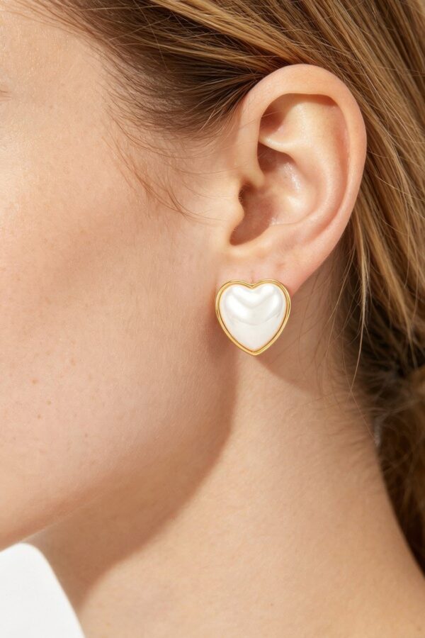 Heart-Shaped Pearl Stud Earrings with Polished Metal Frame