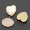 Heart-Shaped Pearl Stud Earrings with Polished Metal Frame