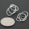 Triple Solar Spiral Earrings - Layered Loop Accent